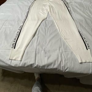 Calvin Klein Joggers, white w/ black logo. Tie waist. Size L